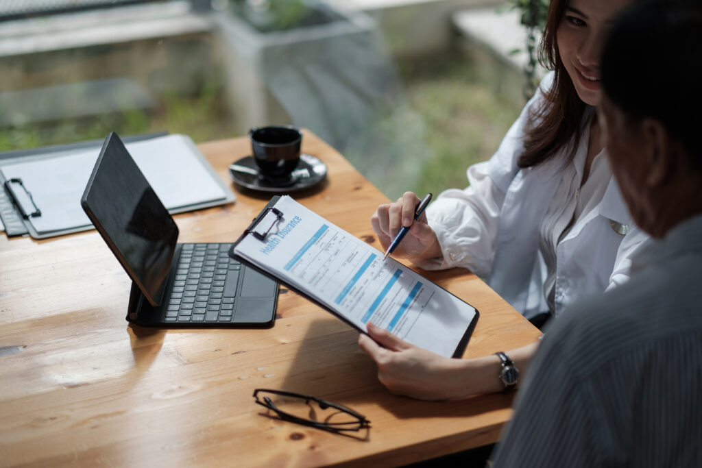 High angle view woman using digital tablet table