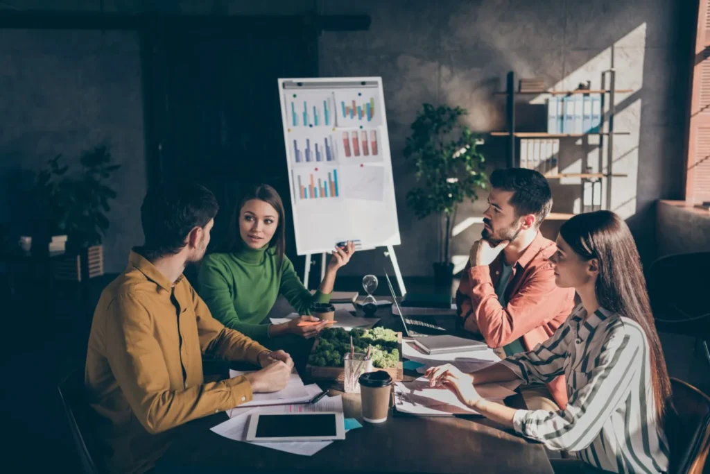 Photo Of Serious Confident Team Discussing The Possibilities To